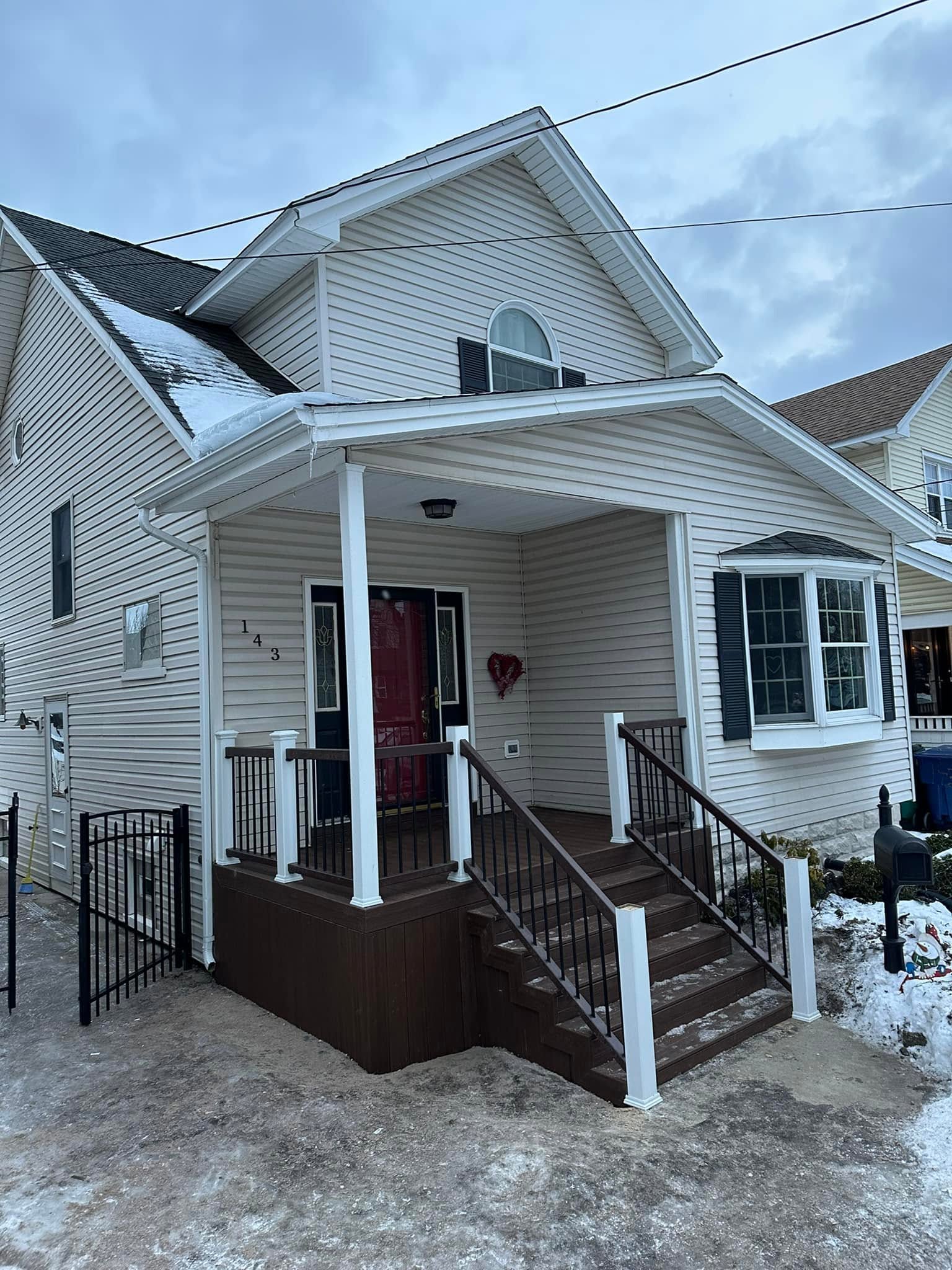 Finished front porch with wood decking